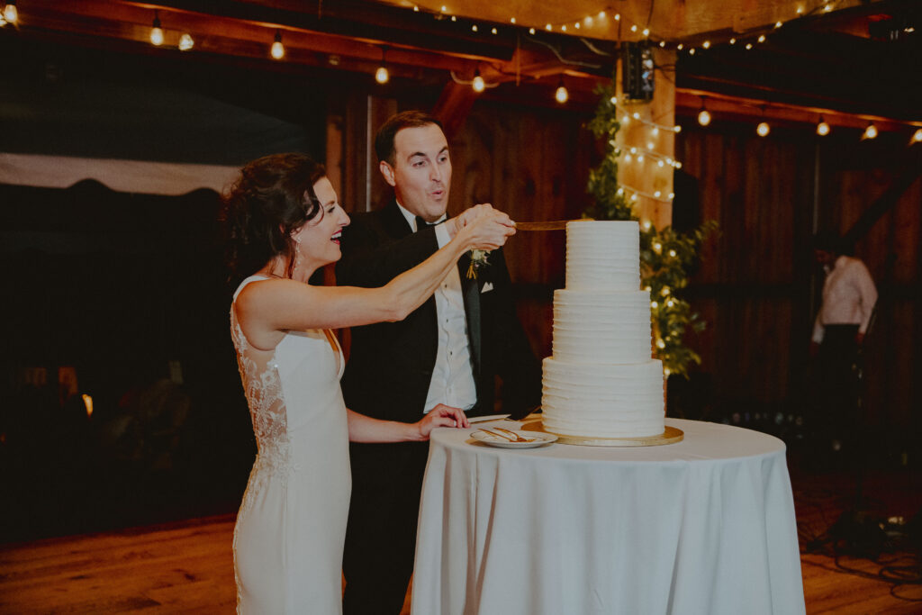 Bride and Groom Cut the wedding cake